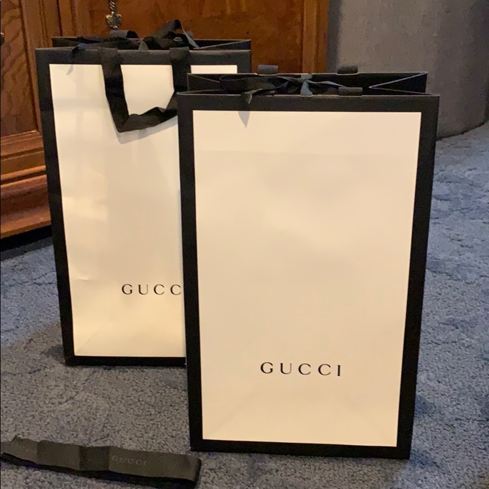 Gucci gift bags and Gucci logo ribbon